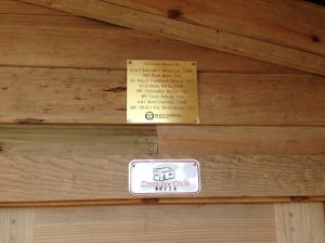 the plaque above the door